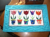 all the tulips in a row