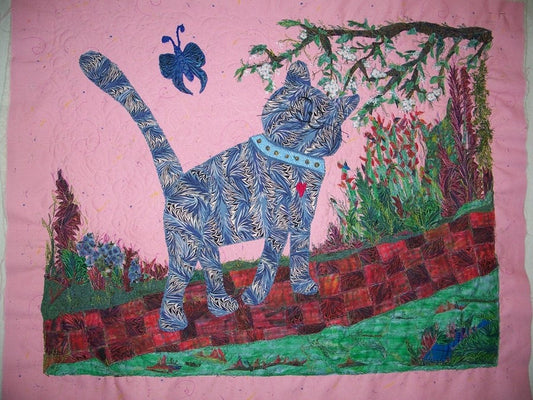 Kitty In The Garden
