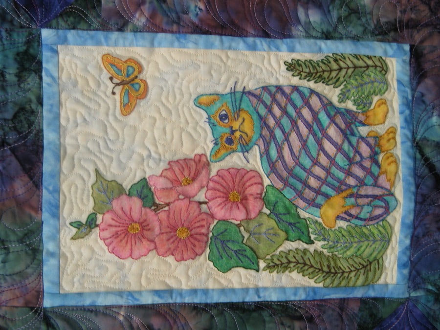 Plaid cats in my garden