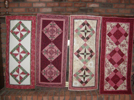 Rose colored wedding table runners