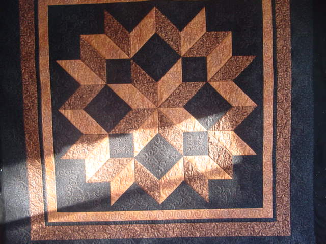 Maxine's Gold & Black Star