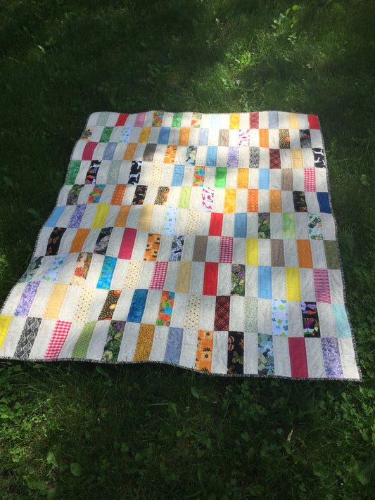 Scrappy strip quilt